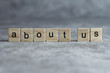 © dolphfyn - About us word written on wood cube