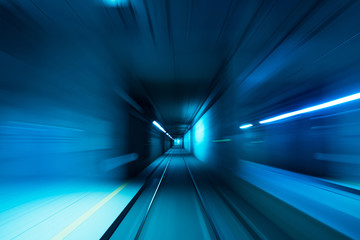 Subway tunnel motion speed rail blue blurred lights