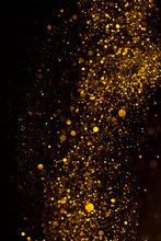 Gold Glitter Dust Dark Abstract Background