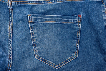 back pocket on blue jeans, full frame