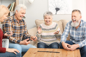 Wall Mural - Happy senior people spending time together in nursing home