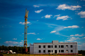 Construction crane and buildings under construction