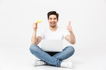 Poster - Full length portrait of a cheerful young man