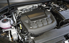 Car Engine Compartment Is Opened. View Of Clean Engine Compartment. Close Up Of Car Engine.