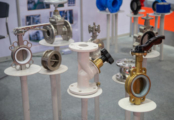 Industrial construction piping system component. Butterfly valve, double regulating valve and plug valve