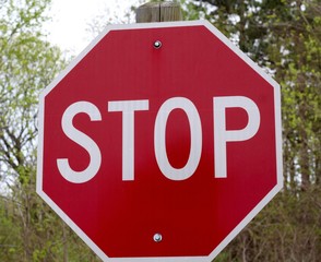 A close view on the red octagon stop sign.