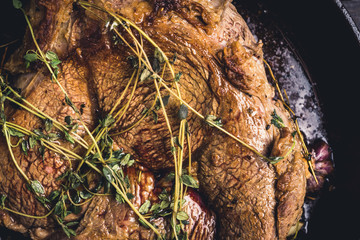 Wall Mural - Grilled meat medium rare on the rustic background. Selective focus. Shallow depth of field.