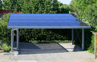 new carport with semi transparent photovoltaik moduls