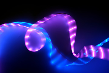 Abstract background of trendy duotone neon led lights on black.