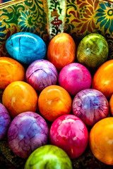 colorful easter eggs in a beautiful bowl