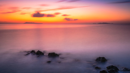 Wall Mural - Scenic view of the sea during a colorful sunset. Mediterranean Sea, Corfu, Greece