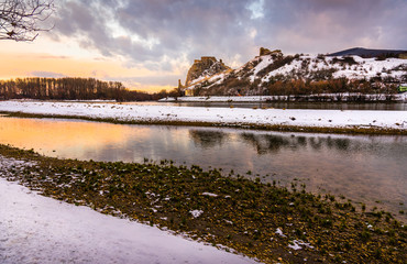 Wall Mural - Snow Covered Devin Castle Ruins above the Danube River in Bratislava, Slovakia at Sunrise