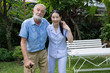 © FrameAngel - senior man happiness and smiling nurse, takes care and discussion and cheer in the garden at nursing home