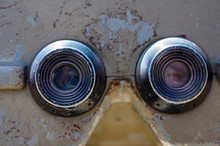 Grey Binoculars With Two Centered Eyepieces