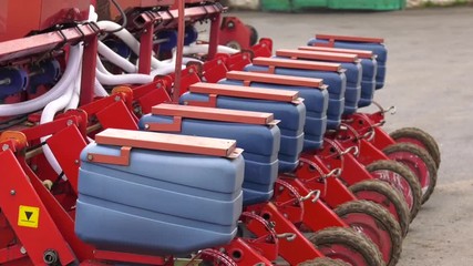 Wall Mural - Precision inline seeder. A row seeder. Seed drill. Agriculture machinery. Fragment of modern pneumatic precision seeder