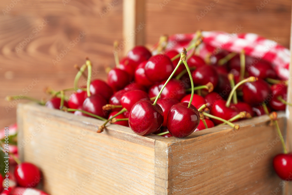 Basket with sweet ripe cherry, closeup