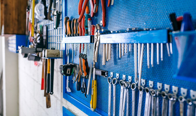 Wall Mural - Detail of motorcycle workshop tools board very well organized