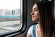 © Георгий Окунев - A young girl on the train looking out the window. Good mood in the journey