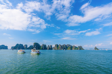 Beautiful scenery views cruising at Ha Long Bay, Hanoi, Vietnam.  blue sky background summer season sunset emerald waters ocean sea,  World Heritage Asia National Park Asian outdoors destinations