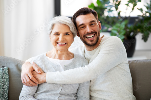 Cuadros en Lienzo family, generation and people concept - happy smiling senior mother with adult s