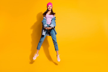 Sticker - Full length body size photo beautiful amazing she her lady hands arms together jump high sporty day off mood cool look wear casual jeans denim jacket shoes pink hat isolated yellow bright background