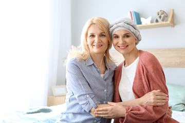 Sticker - Woman after chemotherapy with her mother at home