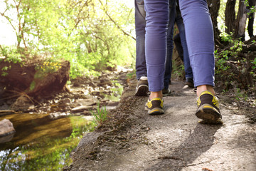 Female tourist walking in forest