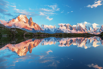 Sunset  panorama of the Lac Blanc lake with Mont Blanc (Monte Bianco) on background in Chamonix location. Beautiful outdoor scene in Vallon de Berard Nature Reserve, France