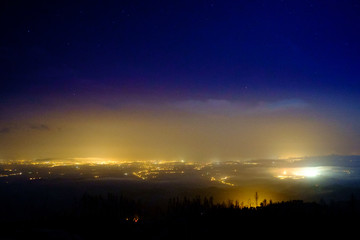 light pollution in a foggy night, portugal.