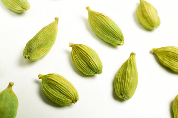 Wall Mural - cradamom isolated on white background, macro images of cardamom.