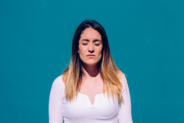 Wall Mural - Portrait of independent young woman with serious, thoughtful and worried face.