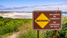 Warning Regarding Recurring Rip Currents And No Lifeguard On Duty Posted On The Pacific Ocean Coastline, California
