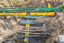 Cables, Pipes And Sewage Under Pedestrian Walkway