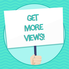 Poster - Word writing text Get More Views. Business photo showcasing Increase web traffic optimise blog strategy analyse digitally Hand Holding Blank White Placard Supported by Handle for Social Awareness