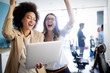 © NDABCREATIVITY - Business people working and brainstorming in office
