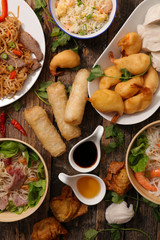 Wall Mural - assorted of asian food on wood background