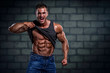 Handsome Bodybuilder Showing Abdominal Muscles