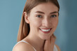 Beauty portrait of smiling woman with white teeth smile