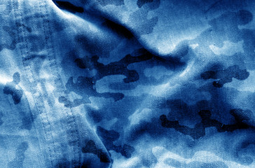 Dirty camouflage cloth with blur effect in navy blue tone.