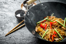 Chinese Wok. Hot Asian Cellophane Noodles In A Frying Pan Wok.