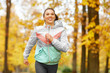 © Syda Productions - fitness, sport, people and healthy lifestyle concept - young woman running in autumn park