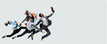 Happy Office Workers Jumping And Dancing In Casual Clothes Or Suit With Folders Isolated On Studio Background. Business, Start-up, Working Open-space, Motion And Action Concept. Creative Collage.