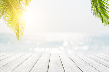 Blurred blue sky and sea with bokeh light