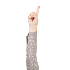 Wall Mural - Woman hand in grey blouse showing finger