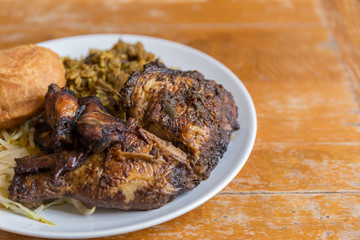 Wall Mural - Jamaican curry goat, jerk chicken and fried dumpling