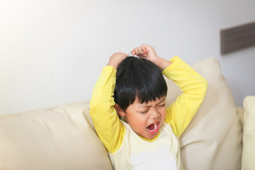 A portrait of angry boy shouting and screaming.