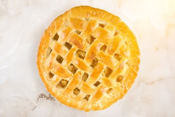 Sticker - Delicious baked pie, top view on white background