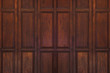 © Pina - Dark brown old ancient wooden swing door background. Thailand traditional style. Using as wall or wallpaper.