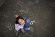 © PixieMe - Asian girl drawing with chalk