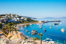 View Of Bodrum Beach, Aegean Sea, Traditional White Houses, Marina, Sailing Boats, Yachts In Bodrum Town Turkey. 